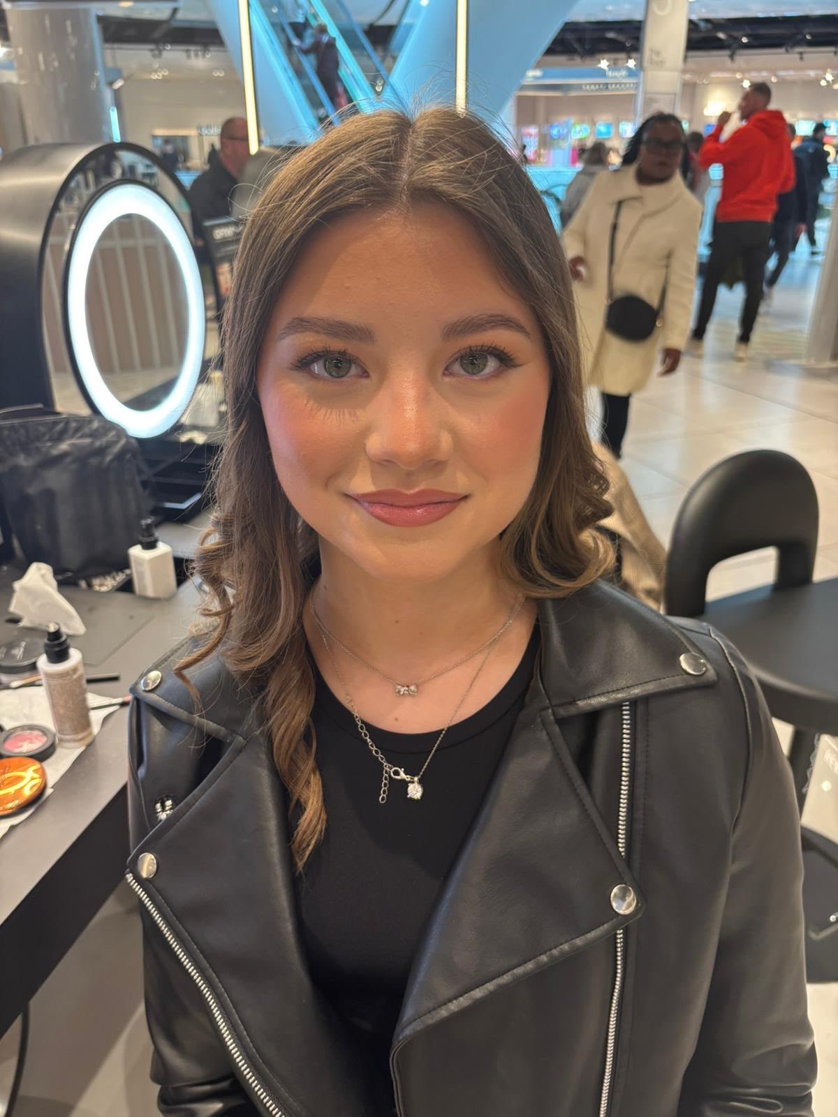 Tamzin at a beauty counter