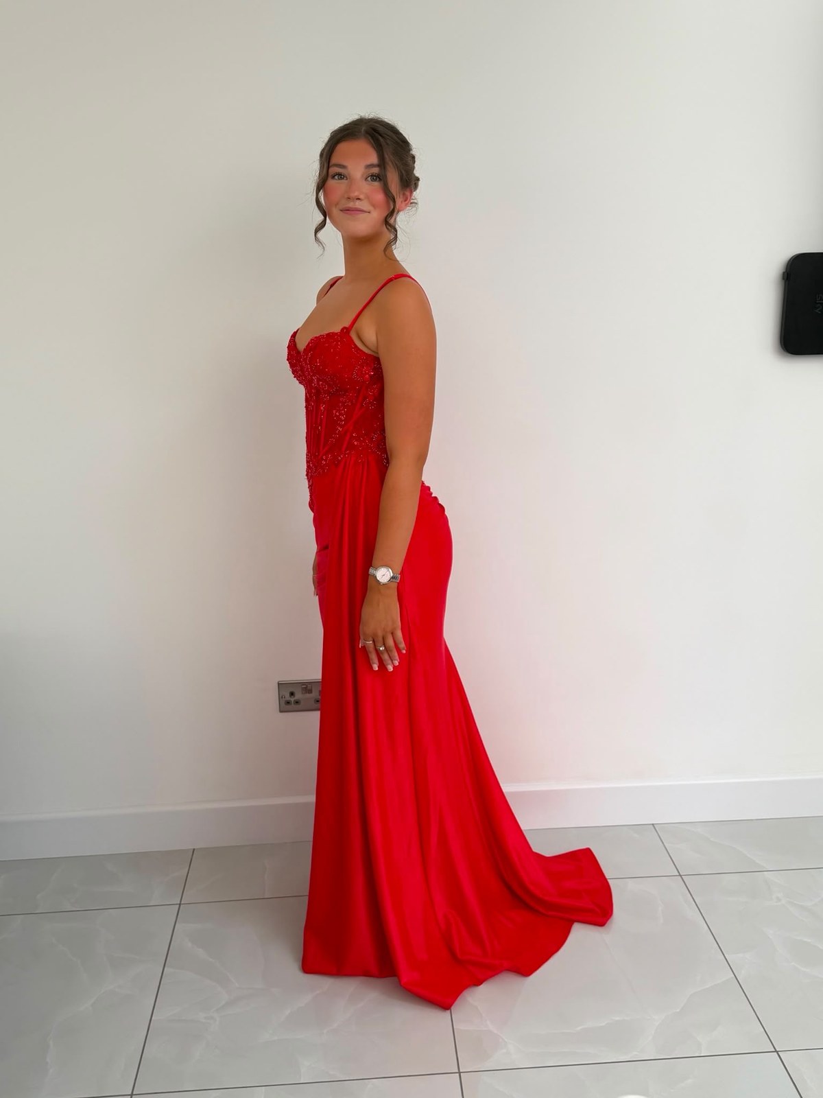 Tamzin in a red dress